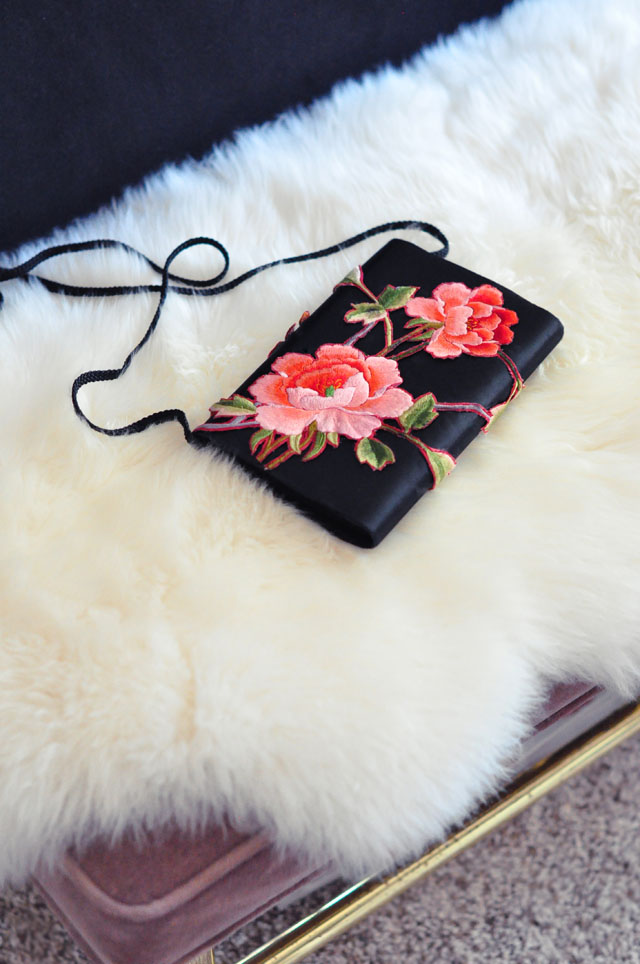 rose embroidered satin clutch bag